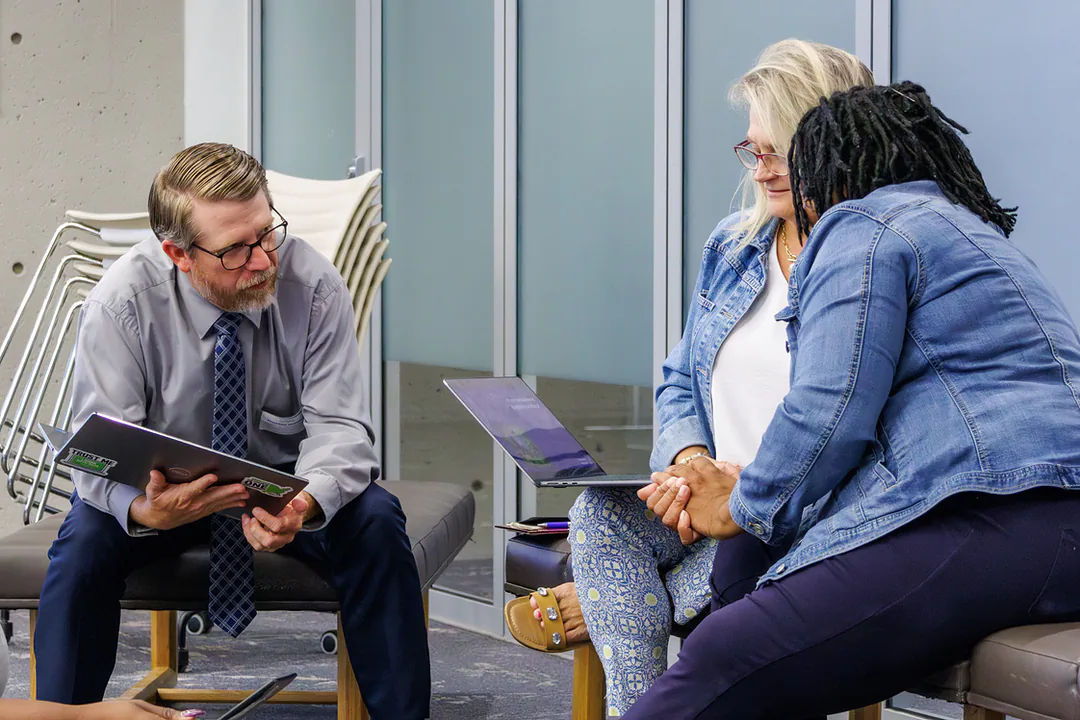 Teacher and district leaders rehearse a MORE lesson together during a table read